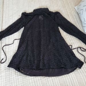 Lace maternity top with black tank top